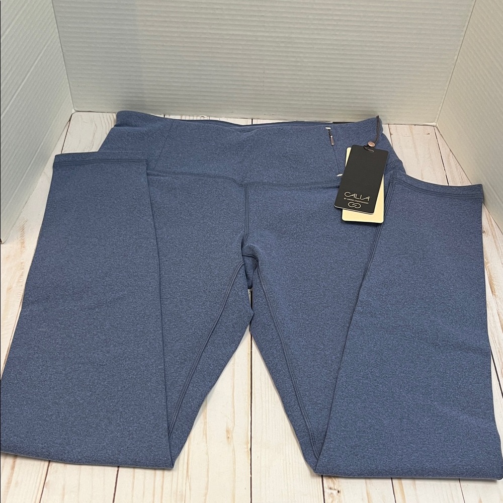 Calia Blue Leggings. Body freeze fabric. Front zip waist pocket.NWT. Size medium - Picture 2 of 7
